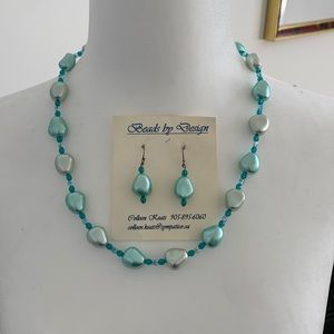 Blue necklace with matching earrings